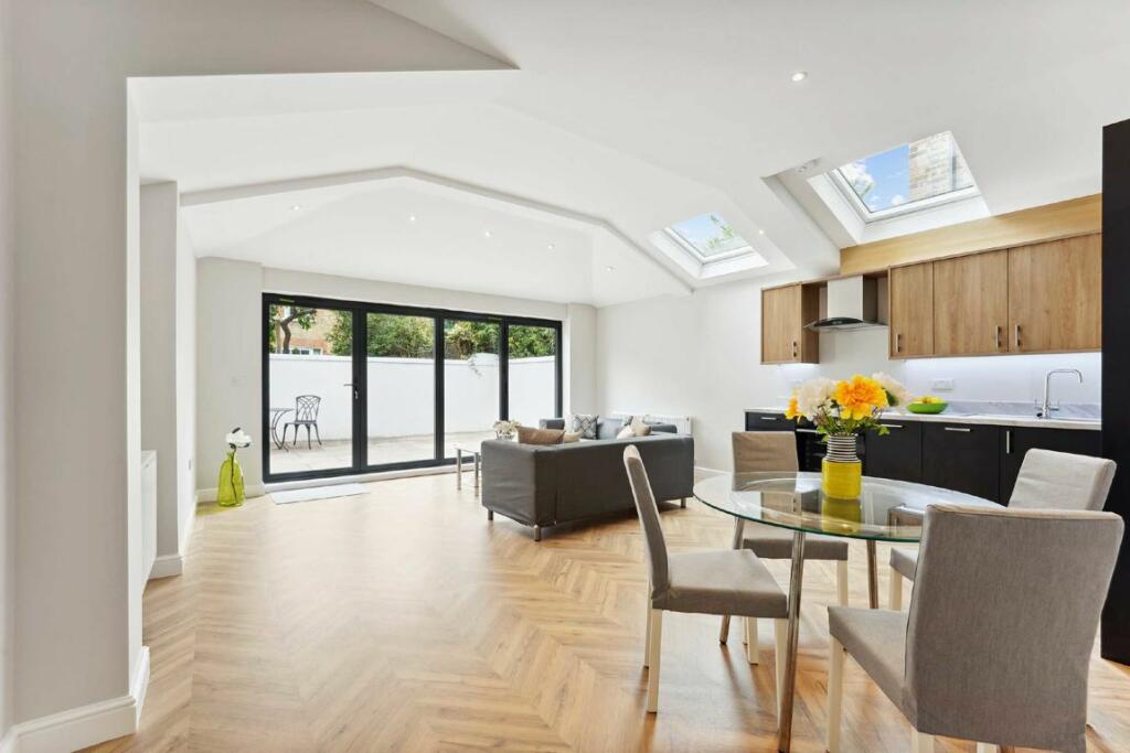 Image of full open plan living and kitchen refurbishment post-completion
