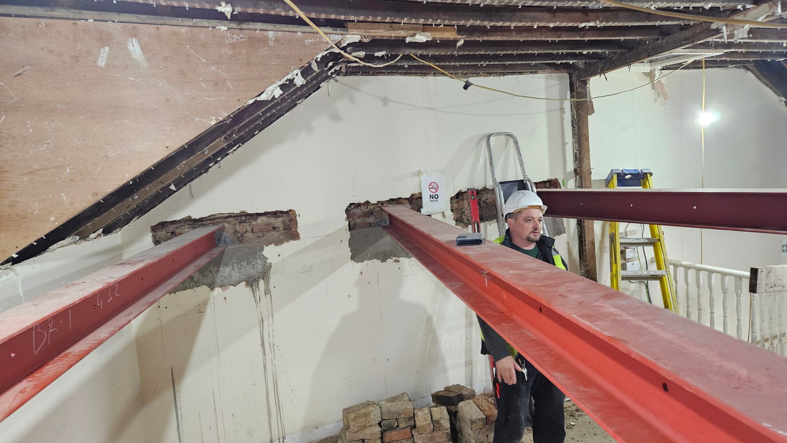 RSJs, structural steel jist being installed during renovation.